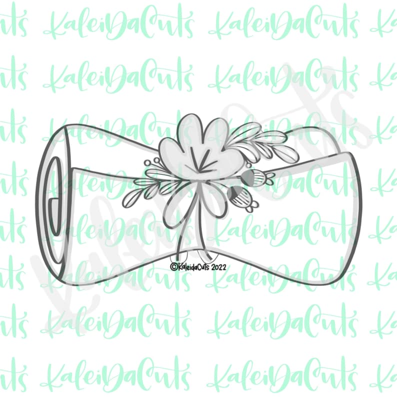 K&ouml;nnte beinhalten: Eine schwarz-wei&szlig;e Umrisszeichnung einer aufgerollten Schriftrolle mit einem floralen Design oben. Die Schriftrolle ist mit einem Band gebunden und hat ein kleines Etikett mit dem Text "KaleidaCuts 2022".