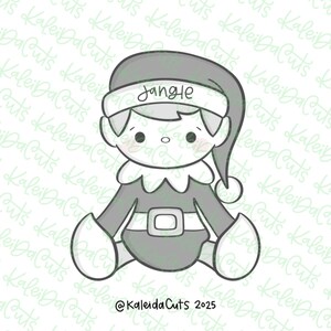 May include: A grayscale illustration of a seated elf with a pointed hat and a belt buckle. The elf's hat has the word "Jangle" written on it. The image is a cookie cutter design.