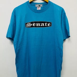 Camiseta vintage de los 90 de Senate Professionals para patinadores agresivos en línea / Skate Surf / Roller Blade / Patinador profesional / Azul / Talla L