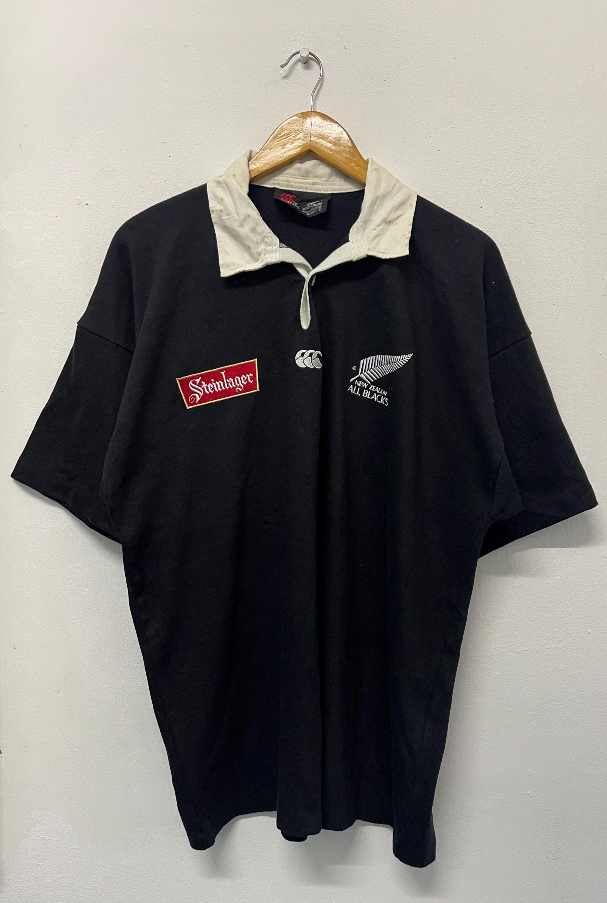Vintage 90s Canterbury of New Zealand : Steinlager Rugby Shirt / Big Logo / Streetwear / 90s Fashions / Baggy / Black / Heavy Cotton / L