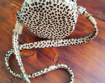 Bolso redondo de leopardo