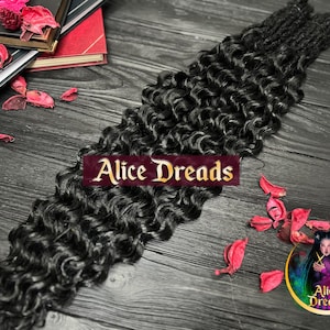 May include: A close-up of long, black, curly hair extensions. The hair is arranged in a loose braid and has a natural, textured look. The text "Alice Dreads" is visible in the image.