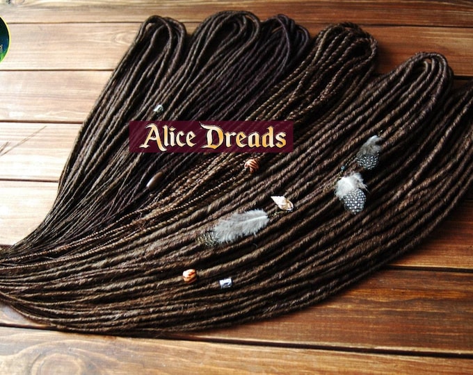 Brown thin dreads with feather beads. Twisted synthetic dreadlocks
