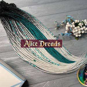 Synthetic dreads dreadlock extensions Black to white and black to turquoise double single ended dreadlocks with wrapped accents