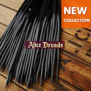 May include: A bundle of black and gray synthetic dreadlocks. The dreadlocks are made of a soft, textured material and are approximately 24 inches long.  The dreadlocks are arranged in a neat, even row.  The text "Alice Dreads" is visible in the image.