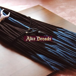 Alice Dreads Black wool dreads with blue ends double or single ended hair extensions custom made dreads by Alice Dreads