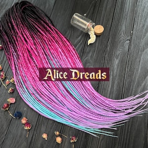Pink thin synthetic dreads with braids ombre black to fuscia magenta to aqua blue hair dreadlocks