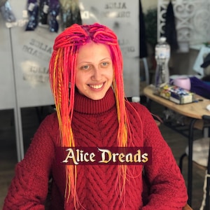 Thin synthetic dreads, bright twisted locks in hot pink, electric yellow dreads with twists, accent hair extensions