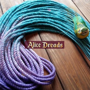Synthetic double ended dreads light purple pink teal blue hair extensions thin dreadlocks and twists Halloween bright dread