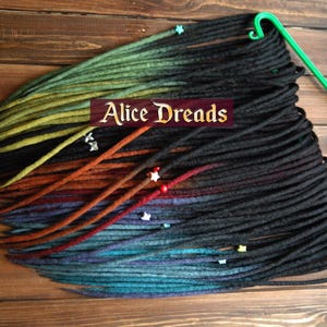 Dread extensions set of wool locks double ended dreadlocks black to blue yellow green orange by Alice Dreads