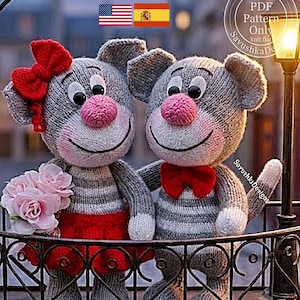 May include: Two grey knitted cat figures with pink noses and black eyes. The left cat wears a red bow on its head and a red skirt, holding pink flowers. The right cat wears a red bow tie. Text reads: PDF Pattern Only SavushkaDesigns.