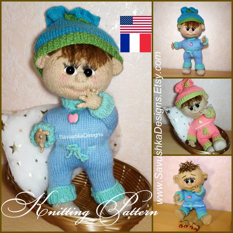 A knitted baby doll wearing a blue jumpsuit and a hat, sitting in a woven basket with a pillow. The doll is handmade, with a cute face, black eyes, and an adorable expression. The PDF pattern is available for download and includes detailed instructions.