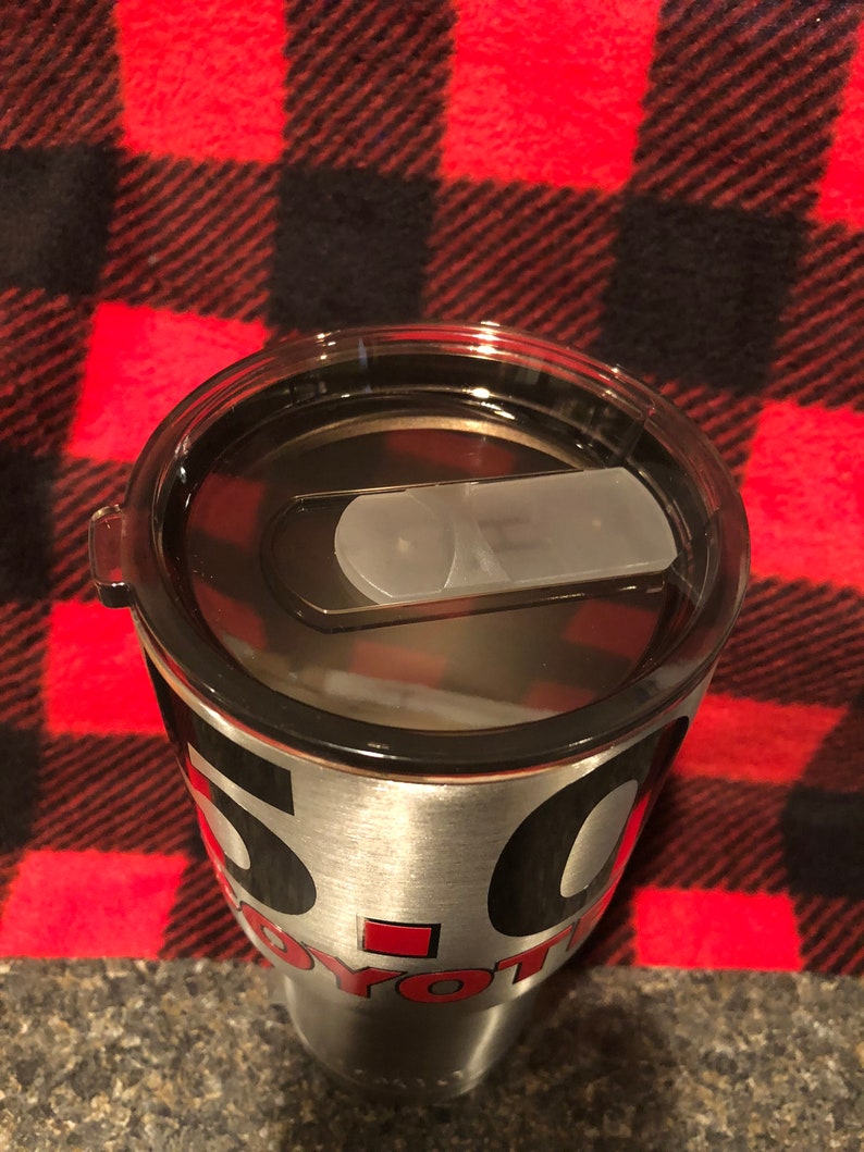 30oz HOGG Tumbler With Sliding Lid Has the 5.0 Coyote Decal on It