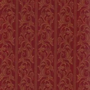 May include: Red and gold patterned fabric with a vertical stripe design. The pattern features ornate, swirling floral and leaf motifs. The fabric has a textured appearance, suitable for upholstery or decorative projects.