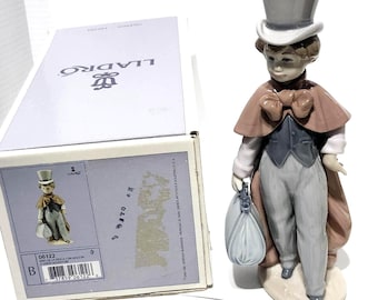 Vintage Lladró Porcelain Figurine – Boy with Suitcase, Retired 1994