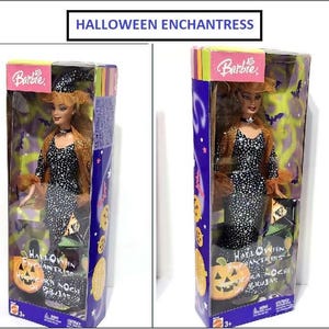 May include: A Barbie Halloween Enchantress doll in original packaging. The doll wears a black dress with silver glitter, a matching hat, and orange accents. The box features a jack-o'-lantern graphic, purple and yellow colors, and the text HALLOWEEN ENCHANTRESS.