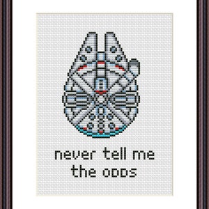 May include: Cross-stitch pattern featuring the Millennium Falcon from Star Wars with the text "never tell me the odds".