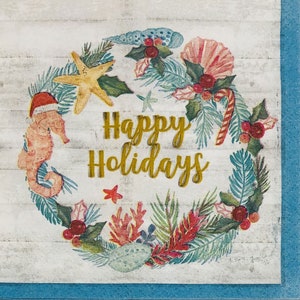 May include: A white background with a wreath of green leaves, red berries, seashells, and a seahorse. The wreath has a gold inscription that reads "Happy Holidays".
