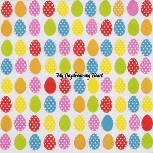 May include: A sheet of colorful Easter egg stickers with white polka dots. The stickers are in various colors, including yellow, red, blue, green, pink, and orange.