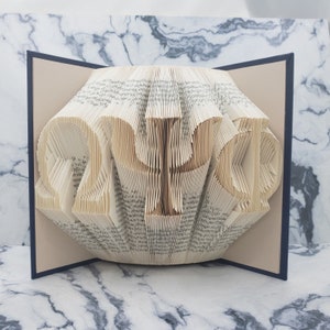 Arte del libro plegado: Omega Psi Phi