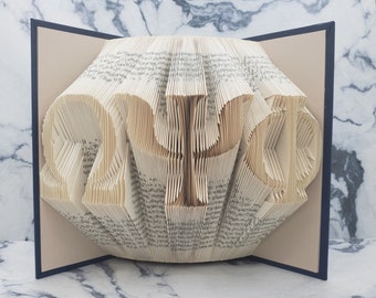 Folded Book Art: Omega Psi Phi
