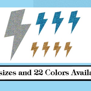 May include: A set of glitter lightning bolt stickers in silver, blue, and gold. 3 sizes and 22 colors available.