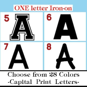 May include: A set of four black capital letter A iron-on transfers displayed in a grid. The letters feature different font styles, labeled with the red numbers 5, 6, 7, and 8. The image includes the text ONE letter Iron-on and Choose from 28 Colors.