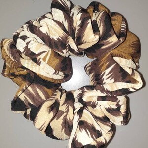 Brown and tan  striped animal print  print  scrunchie,  hair tie