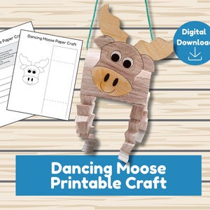 May include: A wooden moose craft with a smiling face and large antlers hangs from a green string. Two sheets of paper with instructions and a moose head outline are on the left. The text "Dancing Moose Printable Craft" is on a blue banner.