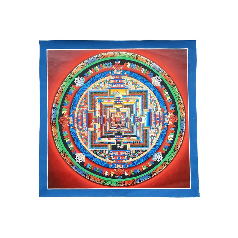 May include: A colorful mandala with a square pattern in the center, surrounded by concentric circles of intricate designs. The mandala is painted on a red background with a blue border.