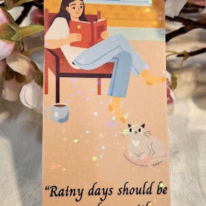 Rainy days bookmark. Laminated for durability. Choose your tassel!
