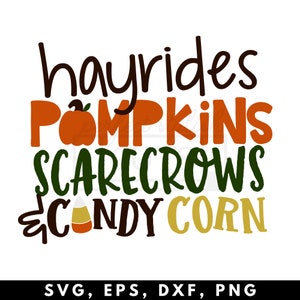 May include: A graphic design featuring the text "hayrides pumpkins scarecrows candy corn" in a fall-themed color palette. The text is stylized with a handwritten font and includes a pumpkin and candy corn graphic.