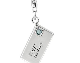 May include: Silver charm shaped like an envelope with a blue gemstone and the inscription "Happy Birthday".