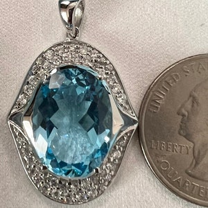 20 Ct Large Genuine Blue Topaz on 925 sterling silver necklace Pendant