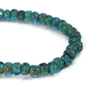 Czech Glass 6/0 (4x3mm) Three Cut Trica Faceted Seed Beads - Deep Aqua Blue Transparent with Picasso Finish - 50 Beads