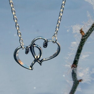 Fall in love with our 2-in-1 Four Leaf Clover Heart Necklace” – yadeepjewels