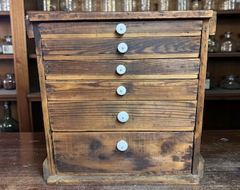 Vintage Rustic Wooden Cabinet: Farmhouse Apothecary Chest with Porcelain Pulls