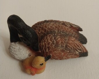 Mamá/bebé pato de resina