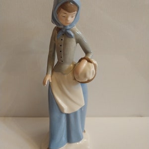 Woman Carrying Picnic Basket