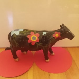 Whimsical Cow Figurine