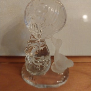 Pig-Tailed Girl Kissing Goose
