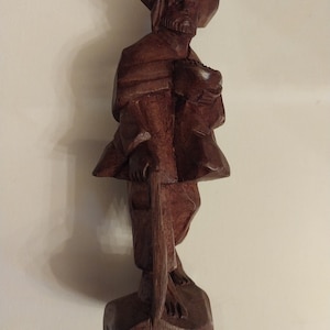 Hand-Carved Barefooted Man