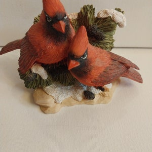 Cardinals On Snow Covered Branch