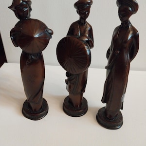 Asian Woman In Traditional Dress Sculpter