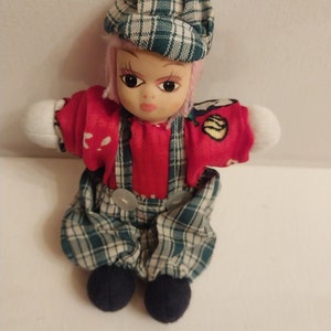 Porcelain Doll With Sand Body In Green Plaid