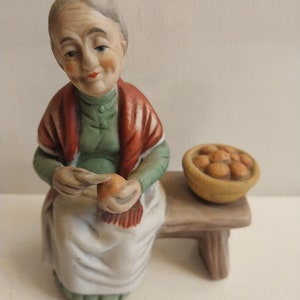 Old Woman Peeling Peaches