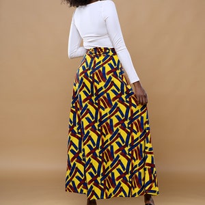 Black Woman Wearing Yellow African Print Wrap Skirt from Besida