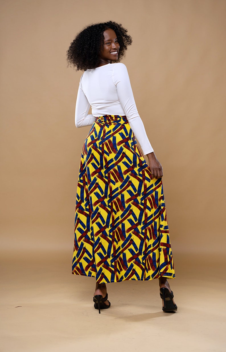 Black Woman Wearing Yellow African Print Wrap Skirt from Besida