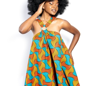 Black Woman Wearing Yellow and Blue African Print Halter Neck Dress from Besida