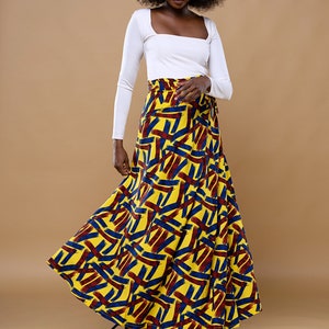 Black Woman Wearing Yellow African Print Wrap Skirt from Besida